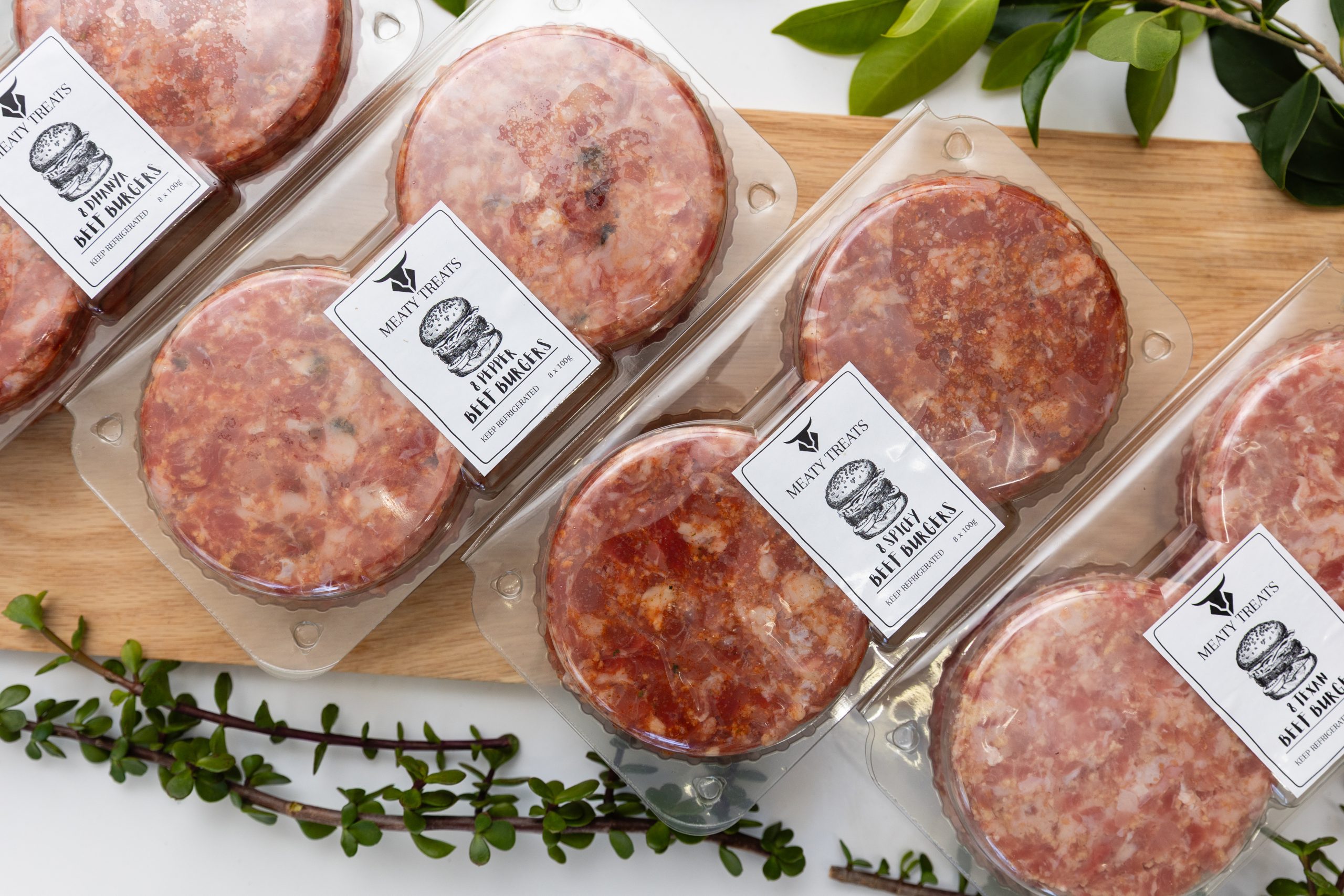 A selection of gourmet burger patties.